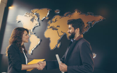 Two sales engineers conclude an international negotiation